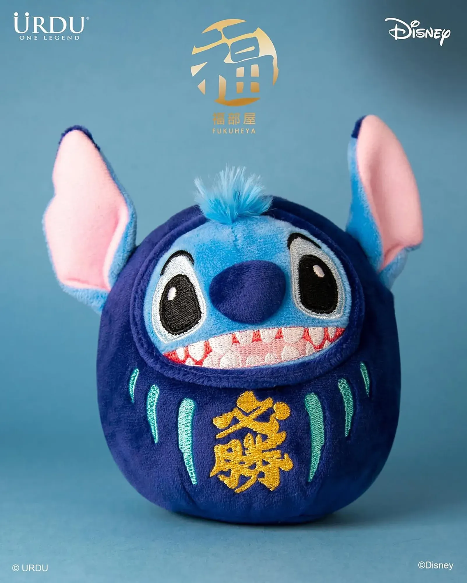 URDU / DISNEY FUKUHEYA LUCKY SERIES DARUMA PLUSH KEYRING - STITCH